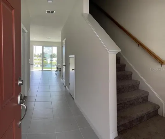 a view of hallway with stairs