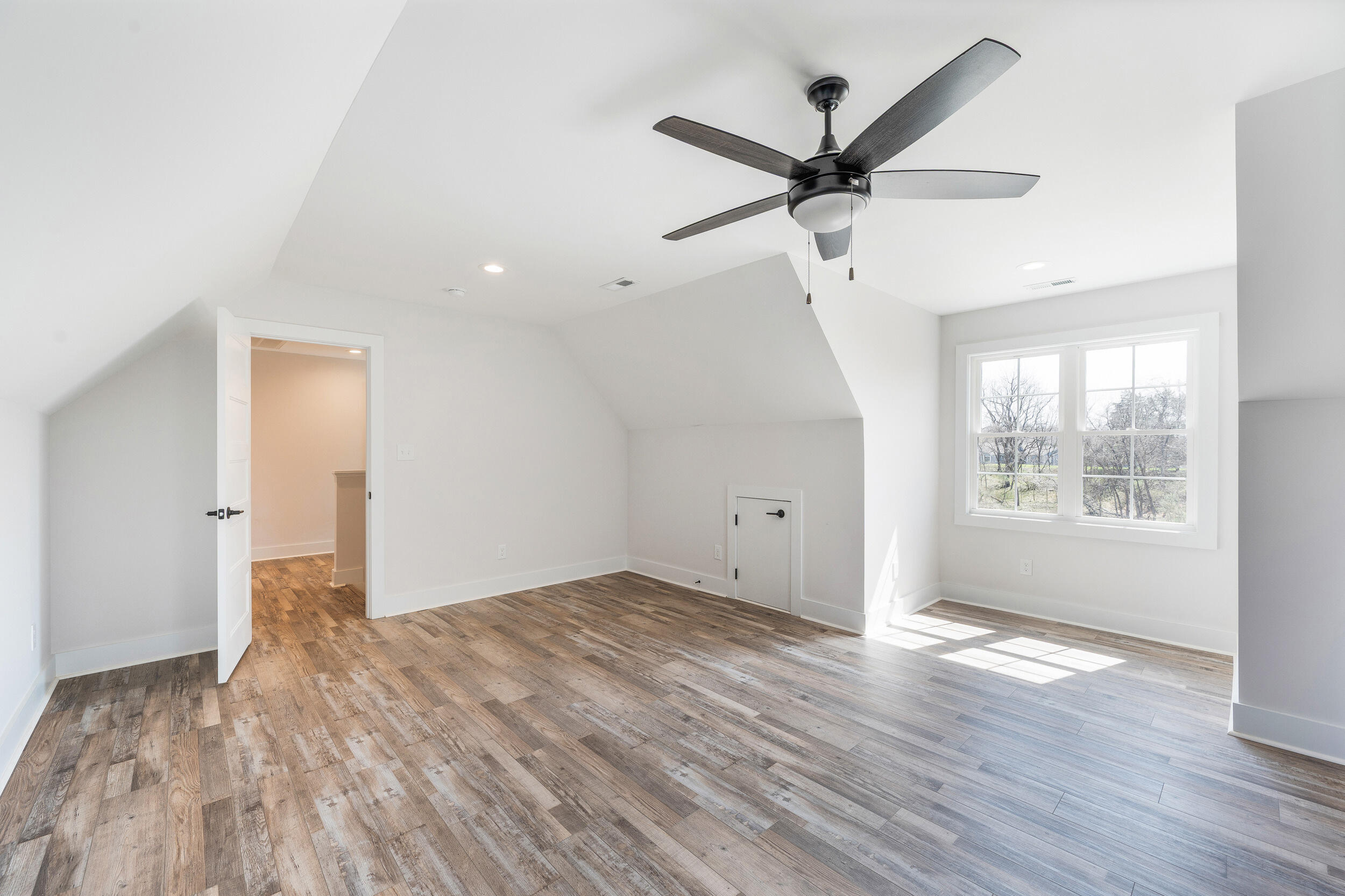 2199 Cottontown Road Forest, VA 24551 - Photo 26 of 35 a view of a livingroom with a ceiling fan and wooden floor