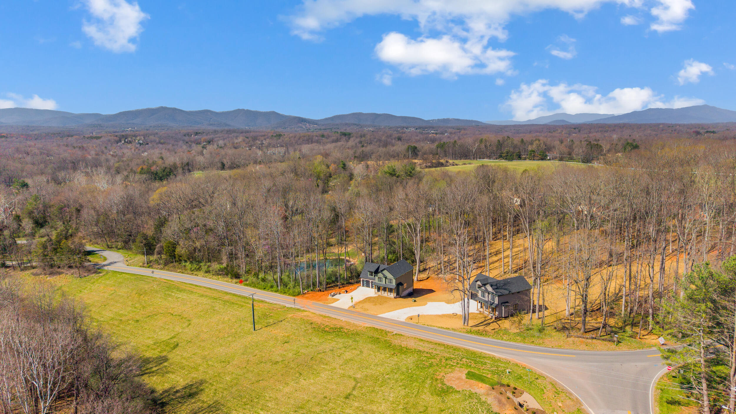 2199 Cottontown Road Forest, VA 24551 - Photo 33 of 35 a view of a lake with mountains in the background