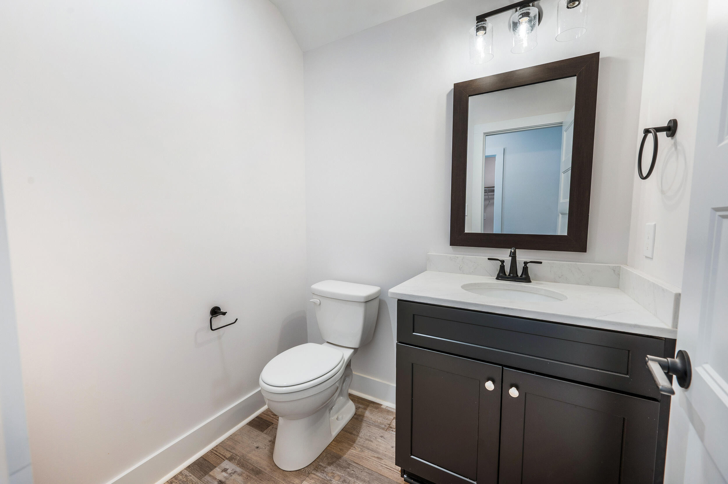 2199 Cottontown Road Forest, VA 24551 - Photo 10 of 35 a bathroom with a toilet sink and mirror