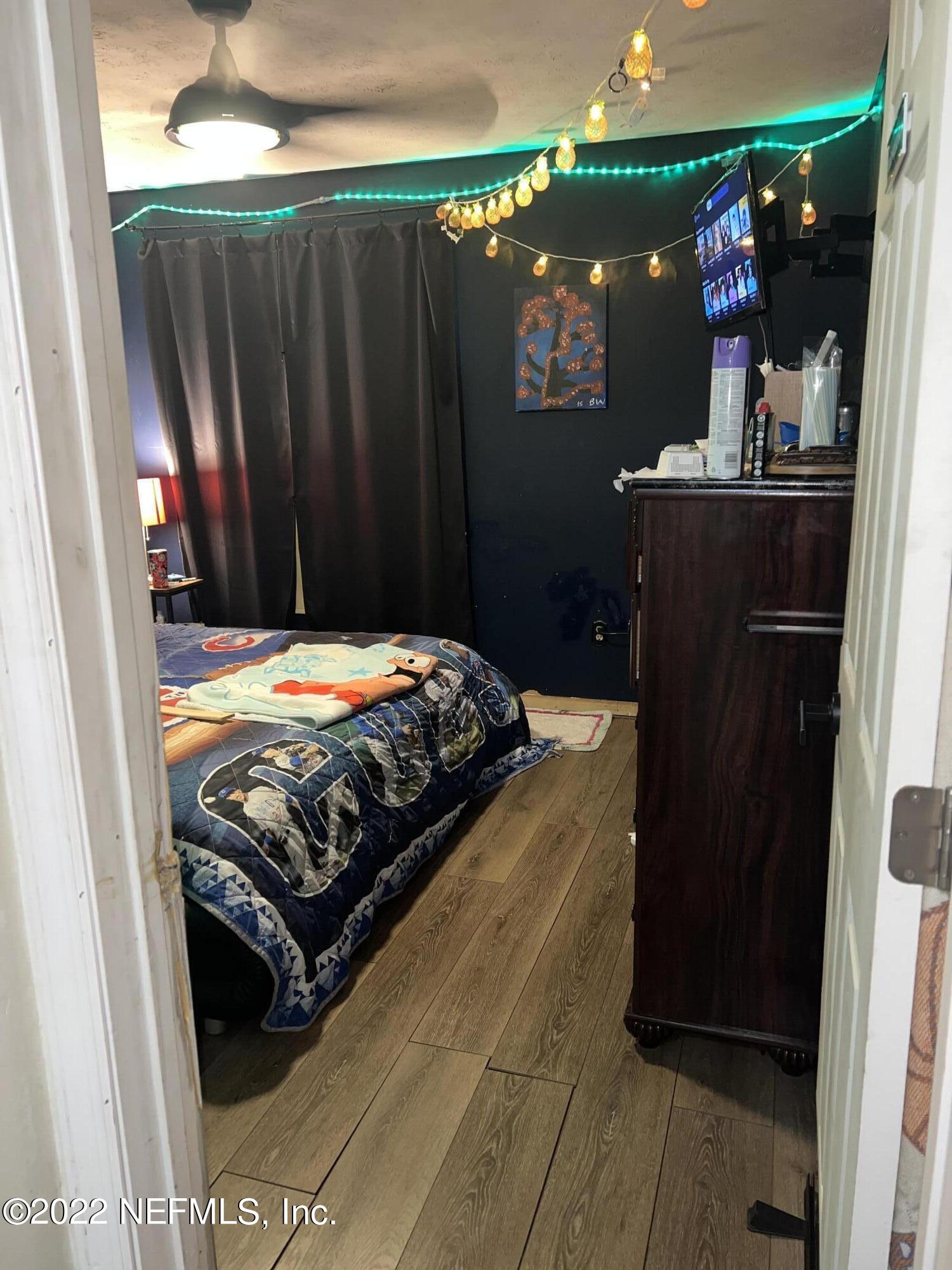 120 Kelly Smith School Road Palatka, FL 32177 - Photo 10 of 17 a bedroom with a bed and a mirror