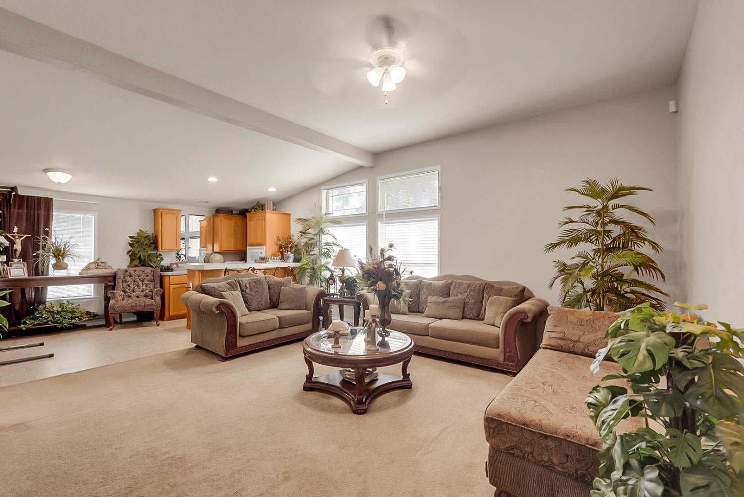19814 West Grant Line Road Tracy, CA 95391 - Photo 12 of 57 a living room with furniture and a large window