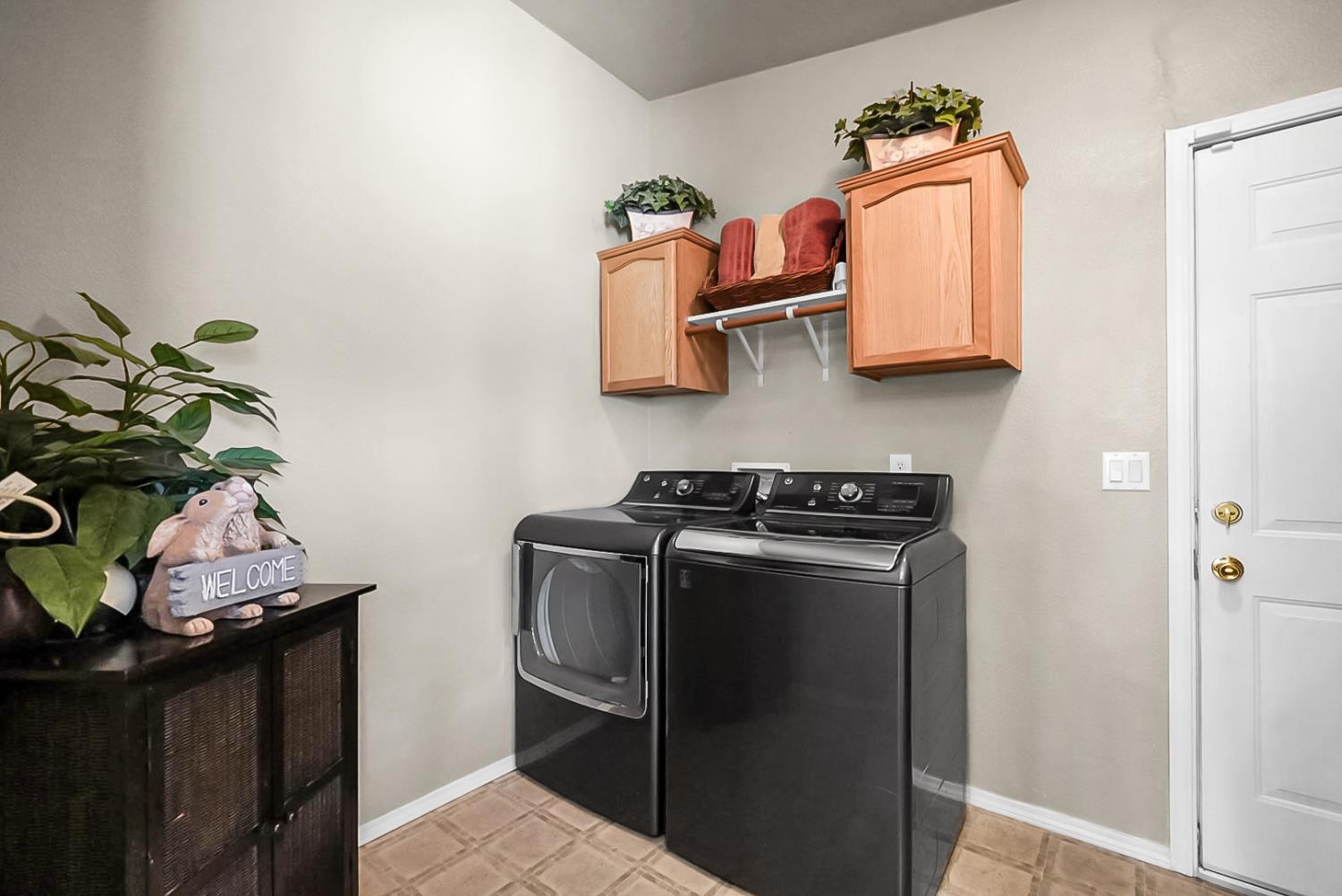 19814 West Grant Line Road Tracy, CA 95391 - Photo 13 of 57 a kitchen with stainless steel appliances granite countertop a refrigerator and a stove
