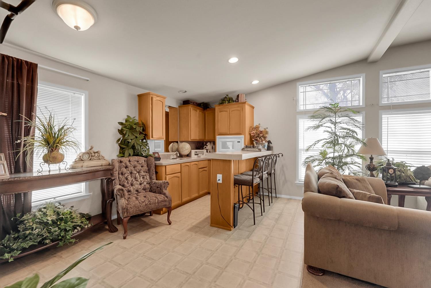 19814 West Grant Line Road Tracy, CA 95391 - Photo 5 of 57 a living room with furniture and a large window