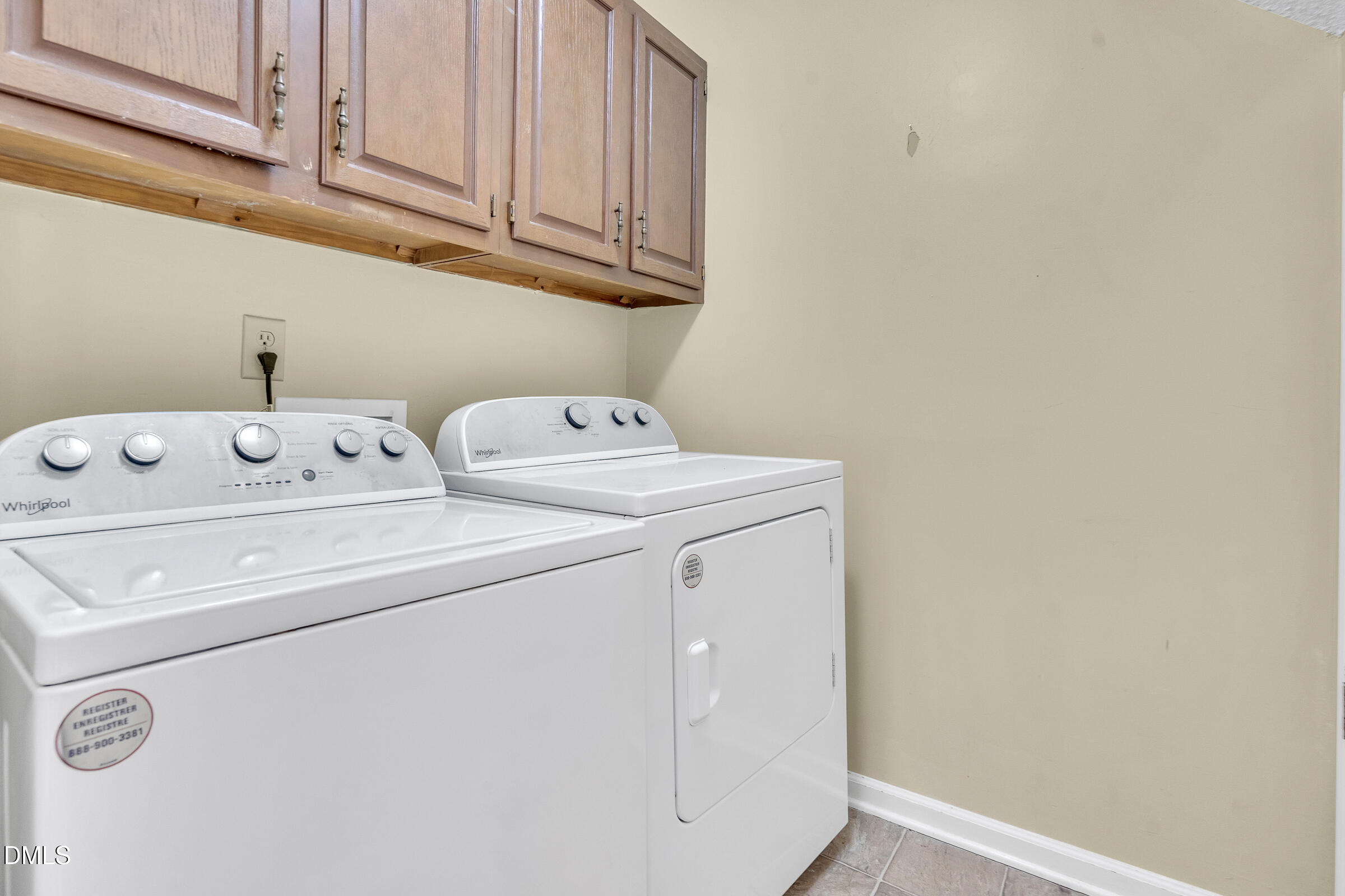 6410 English Oaks Drive Raleigh, NC 27615 - Photo 9 of 19 a utility room with dryer and washer
