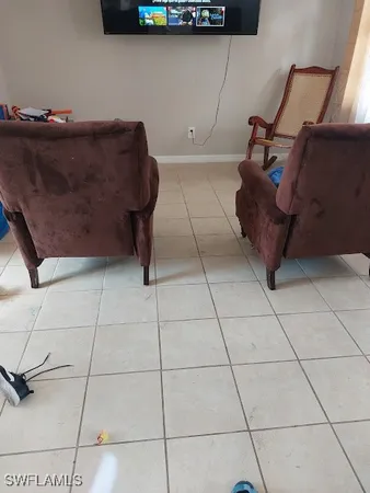 a bathroom with a sink mirror and vanity