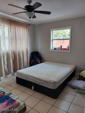 a bedroom with a bed and a shower