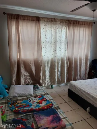 a living room with furniture and baby toys
