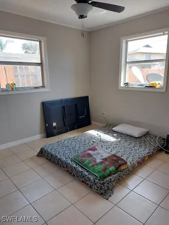 a living room with hard wood flooring