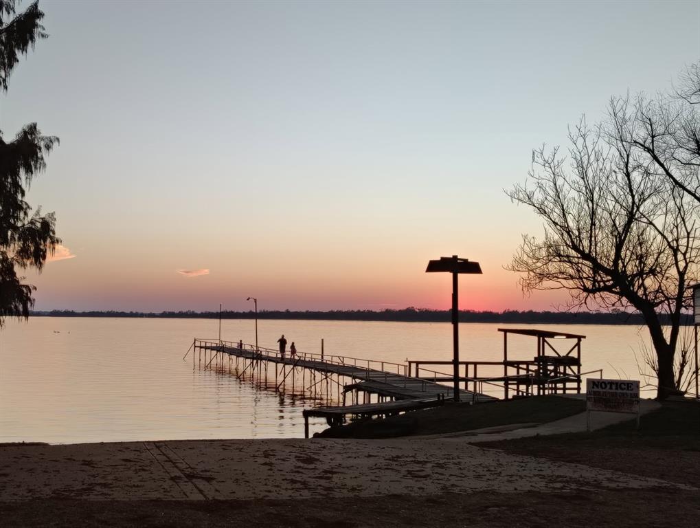 16 D Whitefoot Quitman, TX 75783 - Photo 2 of 7 a view of ocean with a palm tree