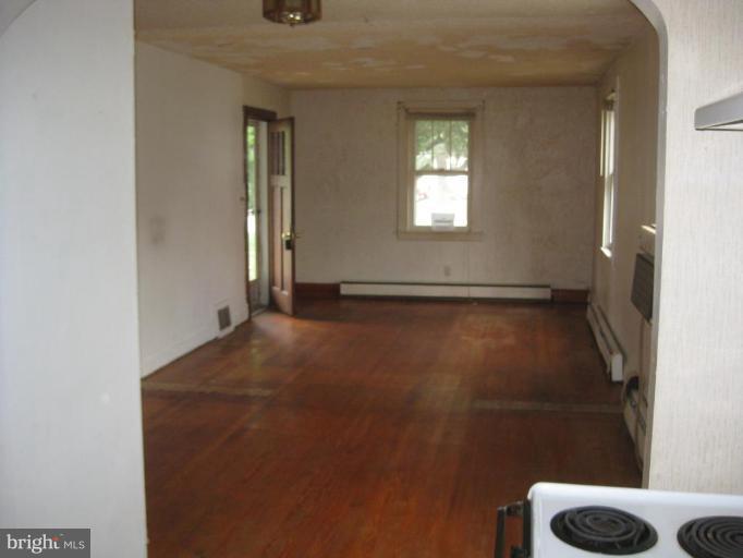 720 Wampler Road Middle River, MD 21220 - Photo 6 of 23 a view of empty room with windows