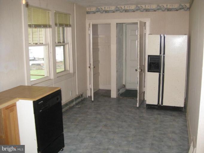 720 Wampler Road Middle River, MD 21220 - Photo 8 of 23 a view of an empty room with a window