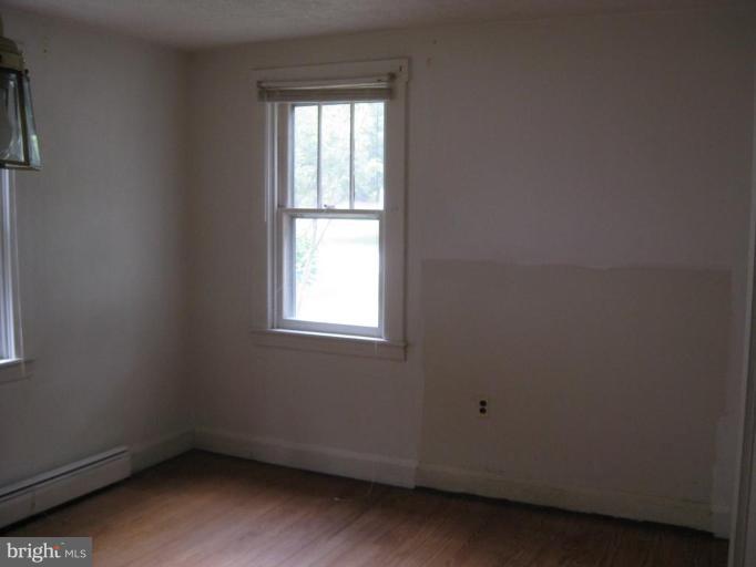 720 Wampler Road Middle River, MD 21220 - Photo 9 of 23 an empty room with a window