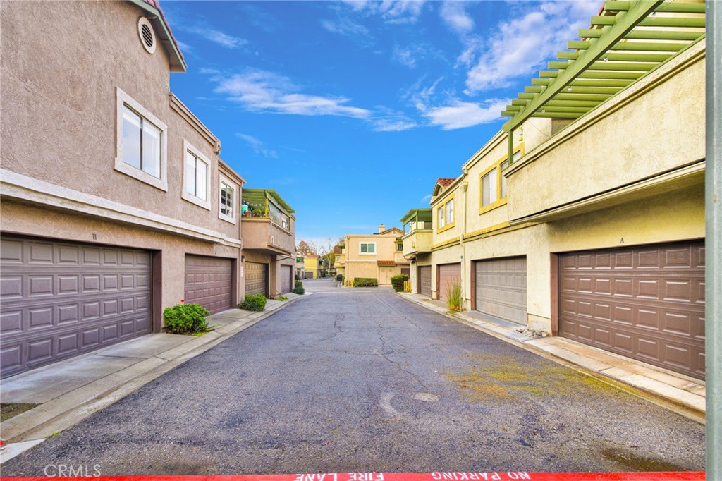 8423 Western Trail Place, Unit H Rancho Cucamonga, CA 91730 - Photo 29 of 42 a view of a street in front of house