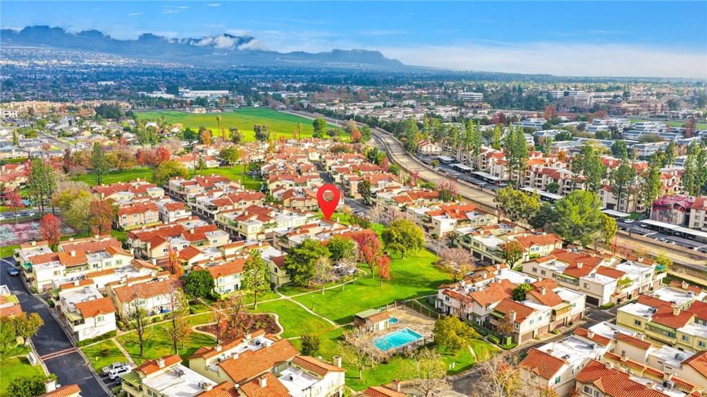 8423 Western Trail Place, Unit H Rancho Cucamonga, CA 91730 - Photo 38 of 42 an aerial view of residential building and lake