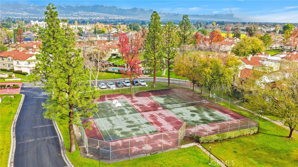 8423 Western Trail Place, Unit H Rancho Cucamonga, CA 91730 - Photo 40 of 42 a view of a swimming pool with an outdoor space