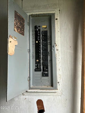 a view of a park with large trees