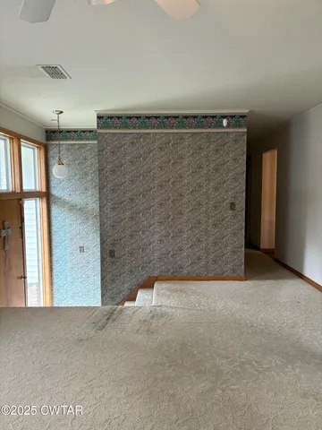 a stove top oven sitting inside of a kitchen