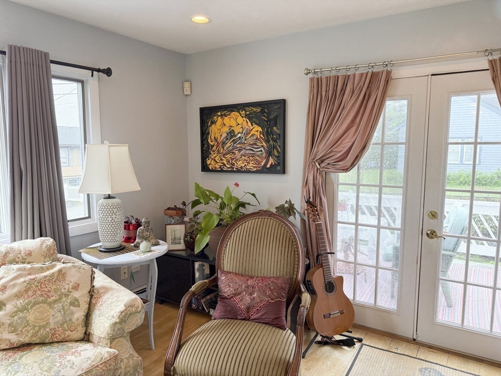 26 Merrill Road, Unit 26 Hull, MA 02045 - Photo 13 of 24 a living room with furniture and a window