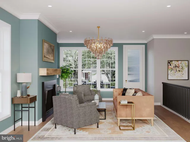 a living room with fireplace furniture and a chandelier