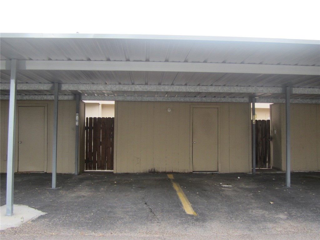6702 Everhart Road, Unit H103 Corpus Christi, TX 78413 - Photo 14 of 14 a view of a livingroom with entryway and kitchen
