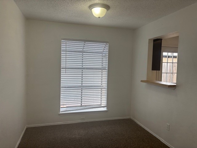 6702 Everhart Road, Unit H103 Corpus Christi, TX 78413 - Photo 4 of 14 an empty room with a window