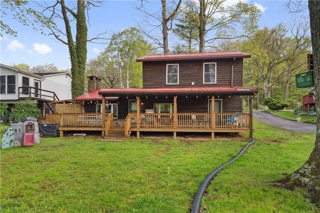 a view of a balcony with chairs
