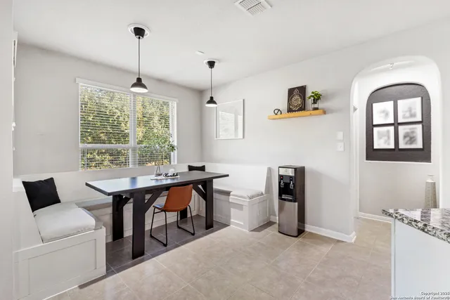a view of a livingroom with furniture and window