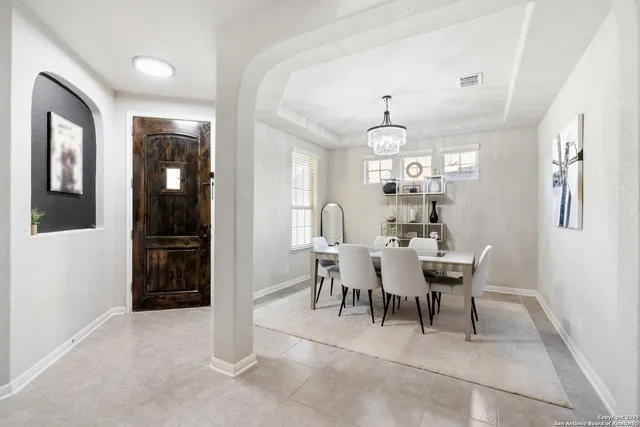 a view of a dining room with furniture