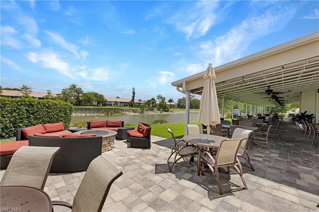 349 Harvard Lane Naples, FL 34104 - Photo 24 of 29 a view of a patio with swimming pool