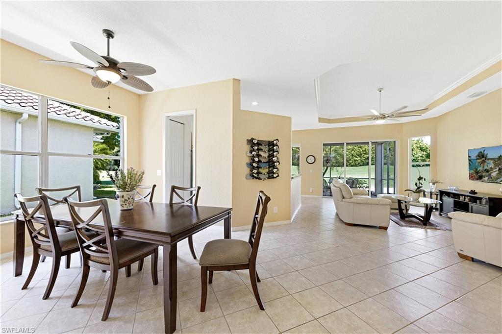 349 Harvard Lane Naples, FL 34104 - Photo 3 of 29 a view of a livingroom and dining room