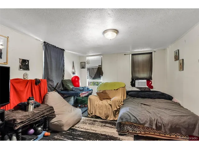 a living room filled with furniture and a couch