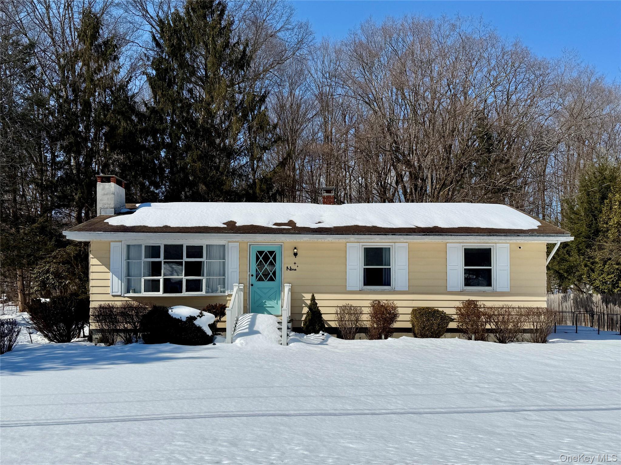 9 King Road Rhinebeck, NY 12572 - Photo 1 of 20 a front view of a house with yard and trees in the background