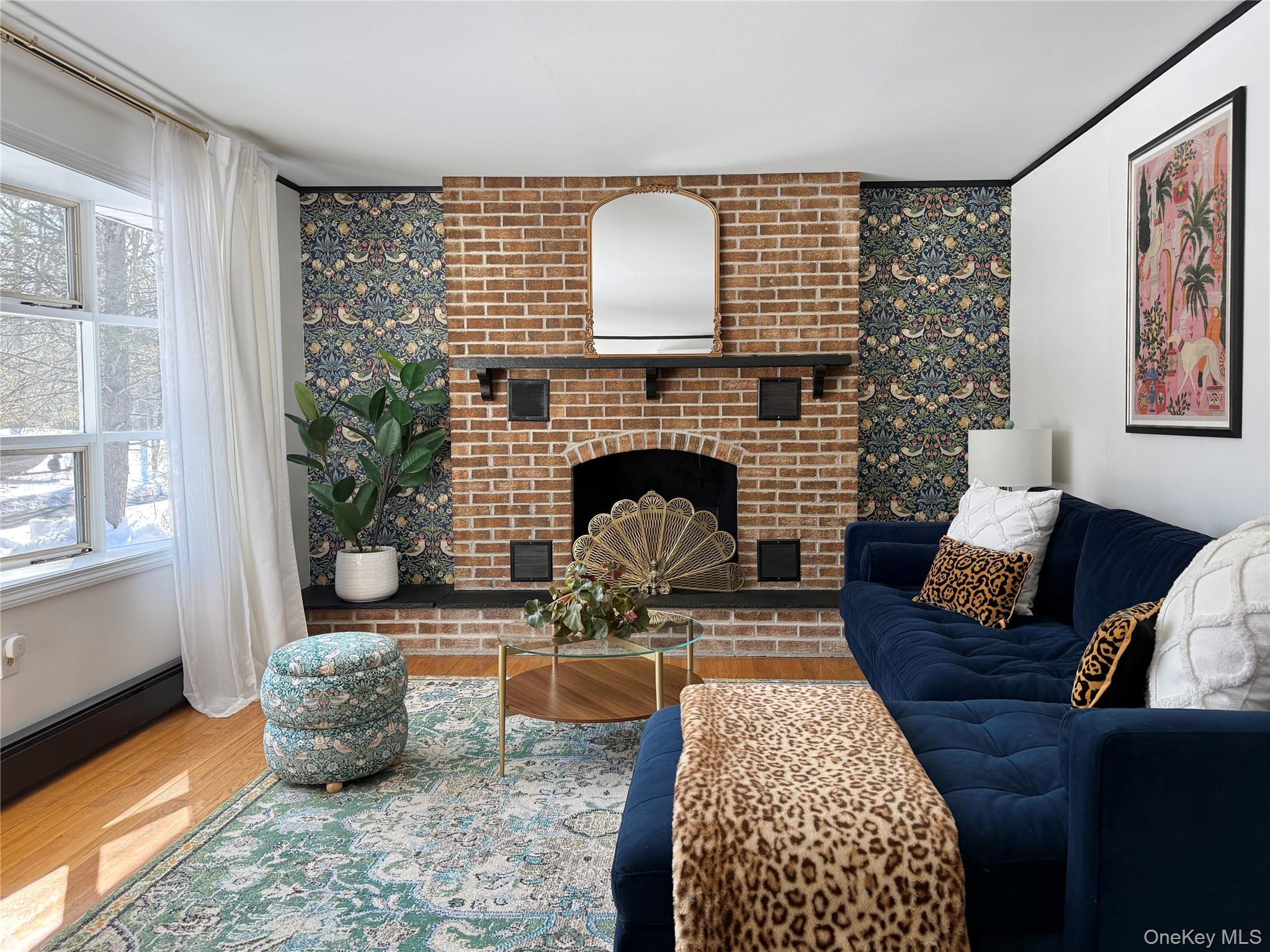 9 King Road Rhinebeck, NY 12572 - Photo 16 of 20 a living room with furniture and a fireplace