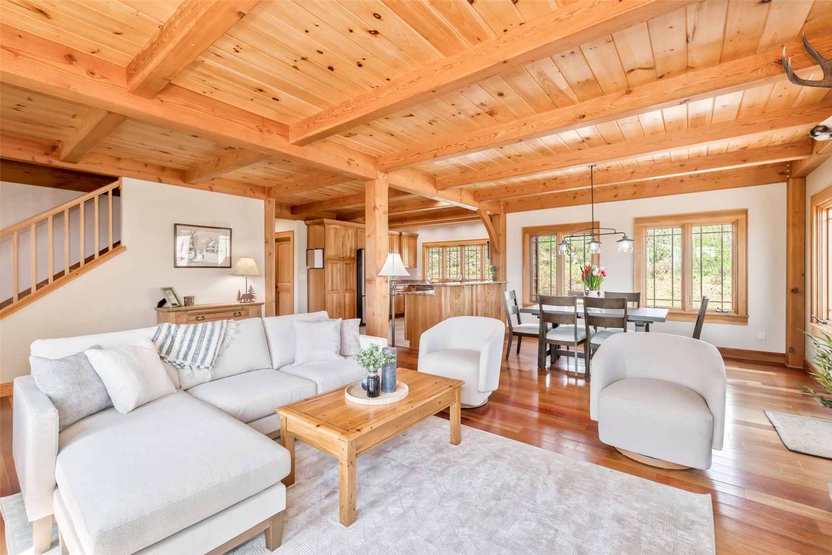 51193 Smith Creek Road Steamboat Springs, CO 80487 - Photo 11 of 48 a living room with furniture and wooden floor