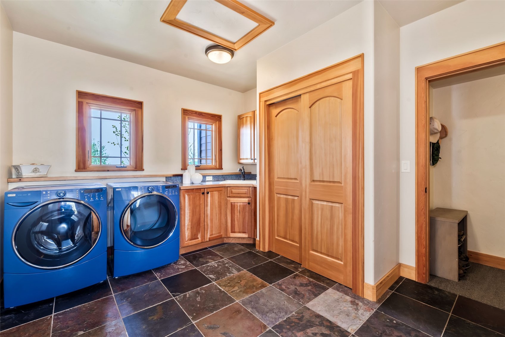 51193 Smith Creek Road Steamboat Springs, CO 80487 - Photo 22 of 48 a utility room with dryer and washer