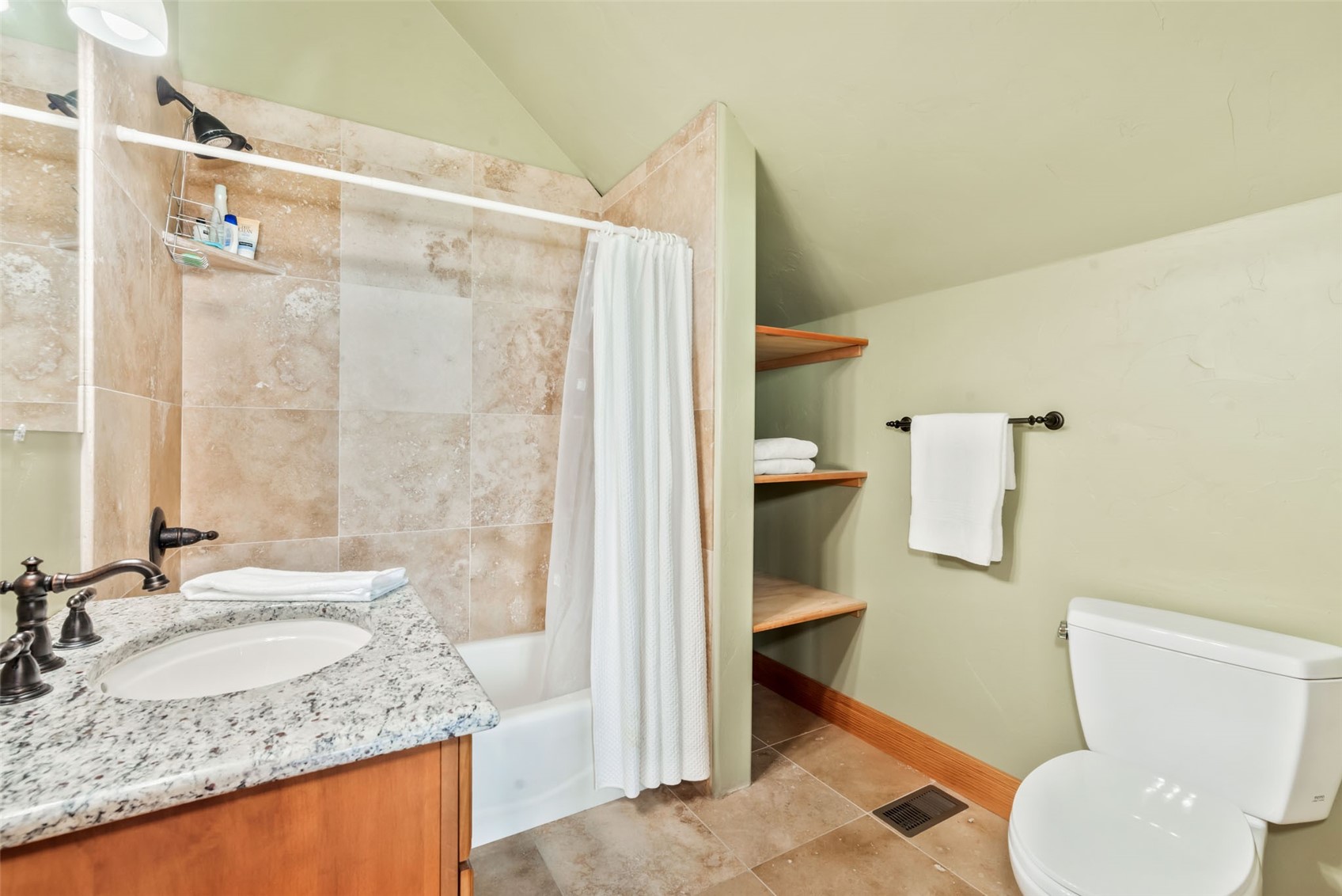 51193 Smith Creek Road Steamboat Springs, CO 80487 - Photo 26 of 48 a bathroom with a granite countertop sink toilet and shower