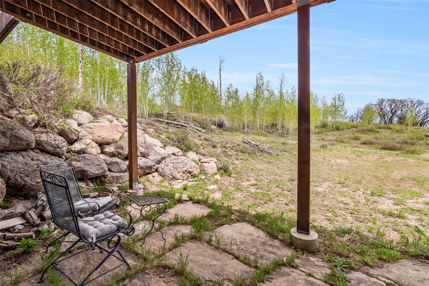 51193 Smith Creek Road Steamboat Springs, CO 80487 - Photo 42 of 48 a view of a yard with an outdoor space