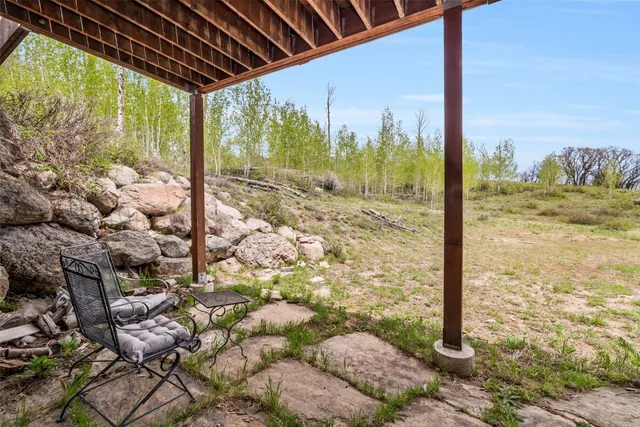 a view of balcony with outdoor seating and wooden floor