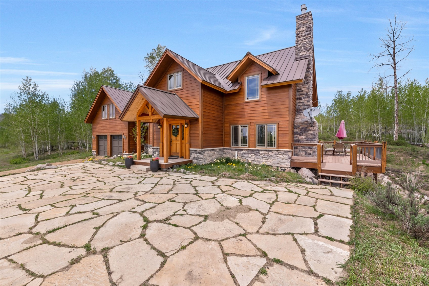 51193 Smith Creek Road Steamboat Springs, CO 80487 - Photo 48 of 48 a front view of a house with a yard