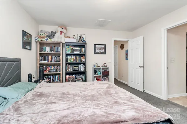 a livingroom with a book shelf