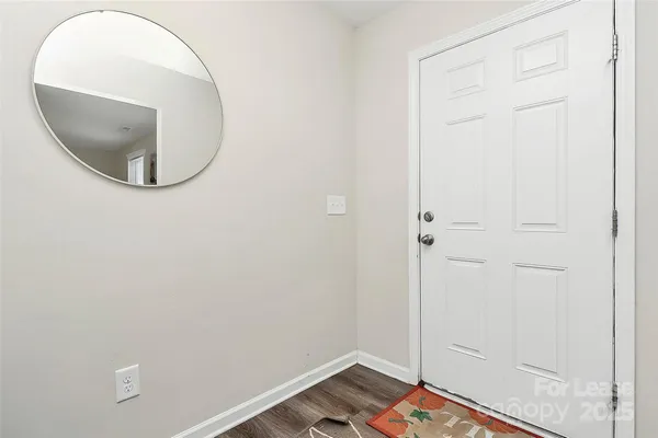 an entryway in wooden floor