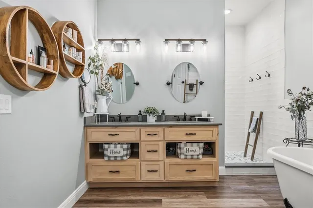 a view of living room with furniture and mirror