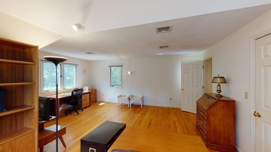 90 Cranberry Circle Sudbury, MA 01776 - Photo 28 of 37 a bed room with a bed and furniture