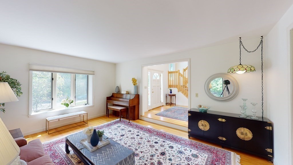 90 Cranberry Circle Sudbury, MA 01776 - Photo 6 of 37 a living room with furniture and a window