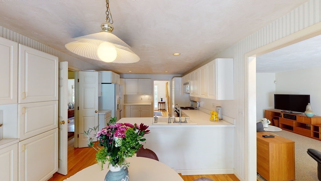 90 Cranberry Circle Sudbury, MA 01776 - Photo 10 of 37 a view of living room with furniture and a potted plant