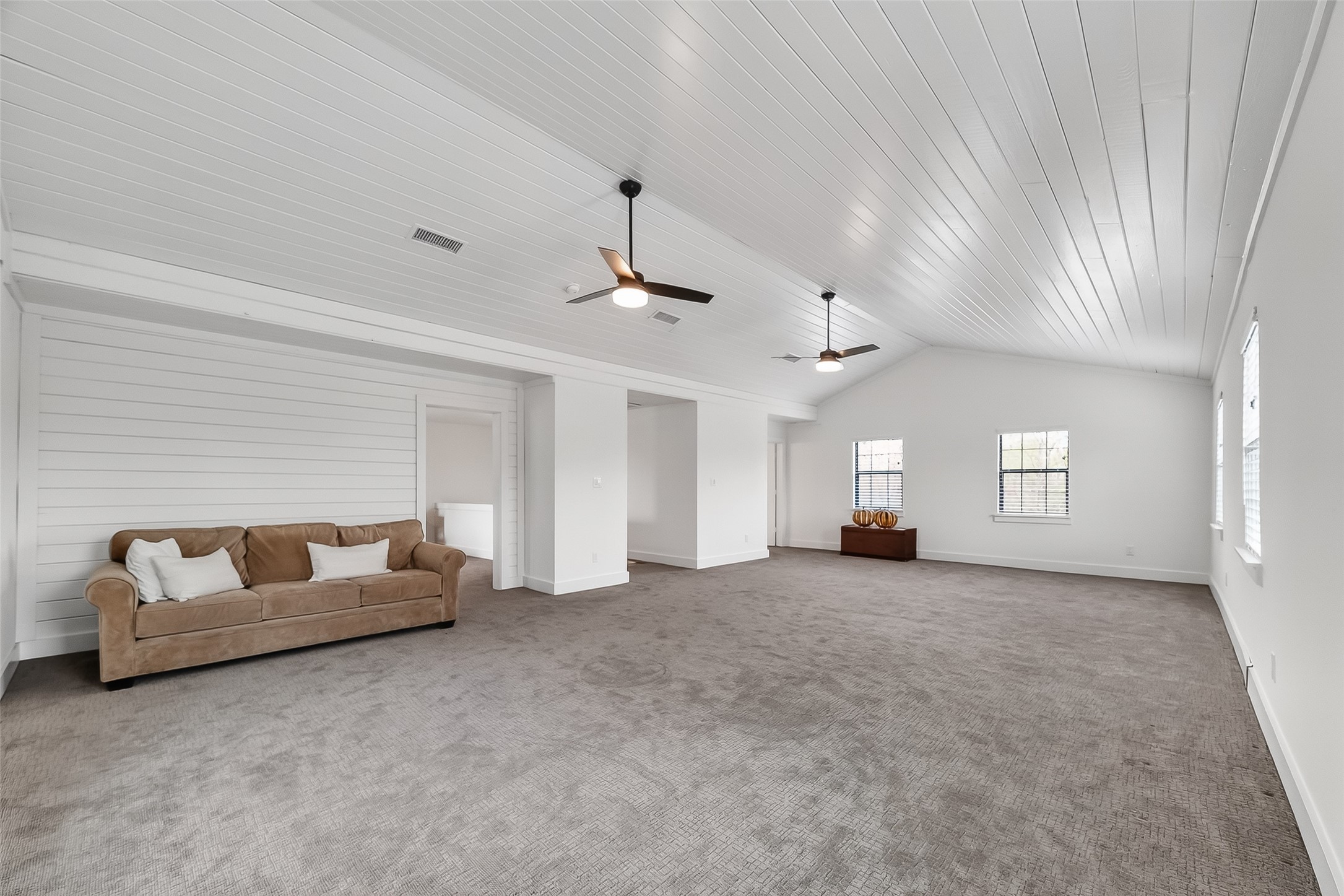 1808 Tabor Street Houston, TX 77009 - Photo 15 of 26 a big room with chandelier and windows