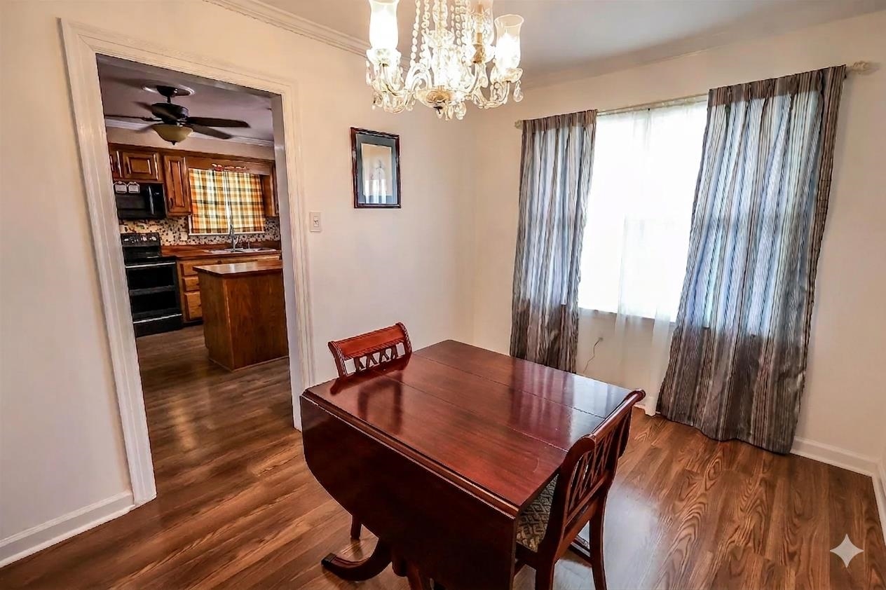 7840 Munford Giltedge Road Burlison, TN 38015 - Photo 33 of 38 a dining room with furniture and window