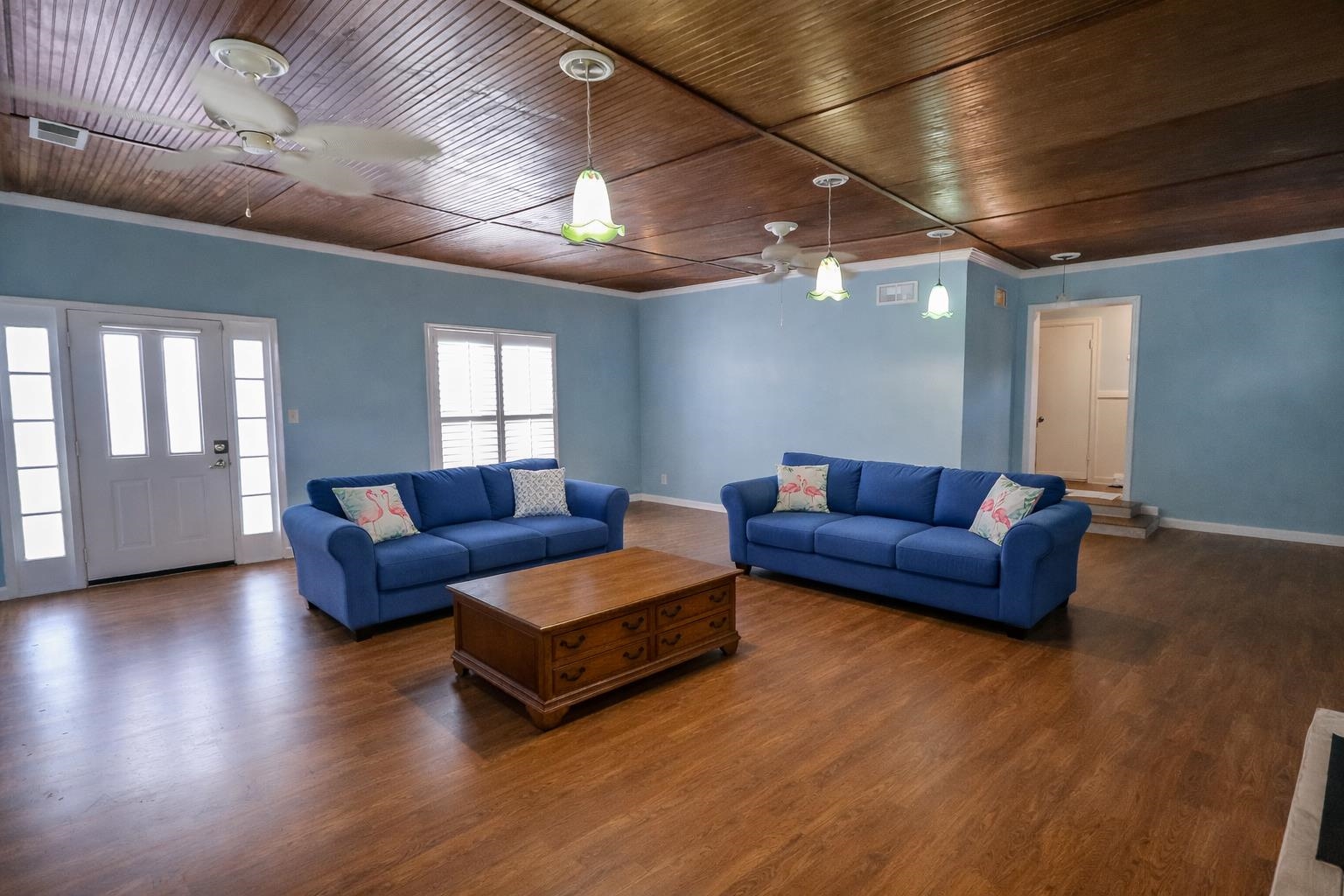 7840 Munford Giltedge Road Burlison, TN 38015 - Photo 6 of 38 a living room with couches and a fireplace