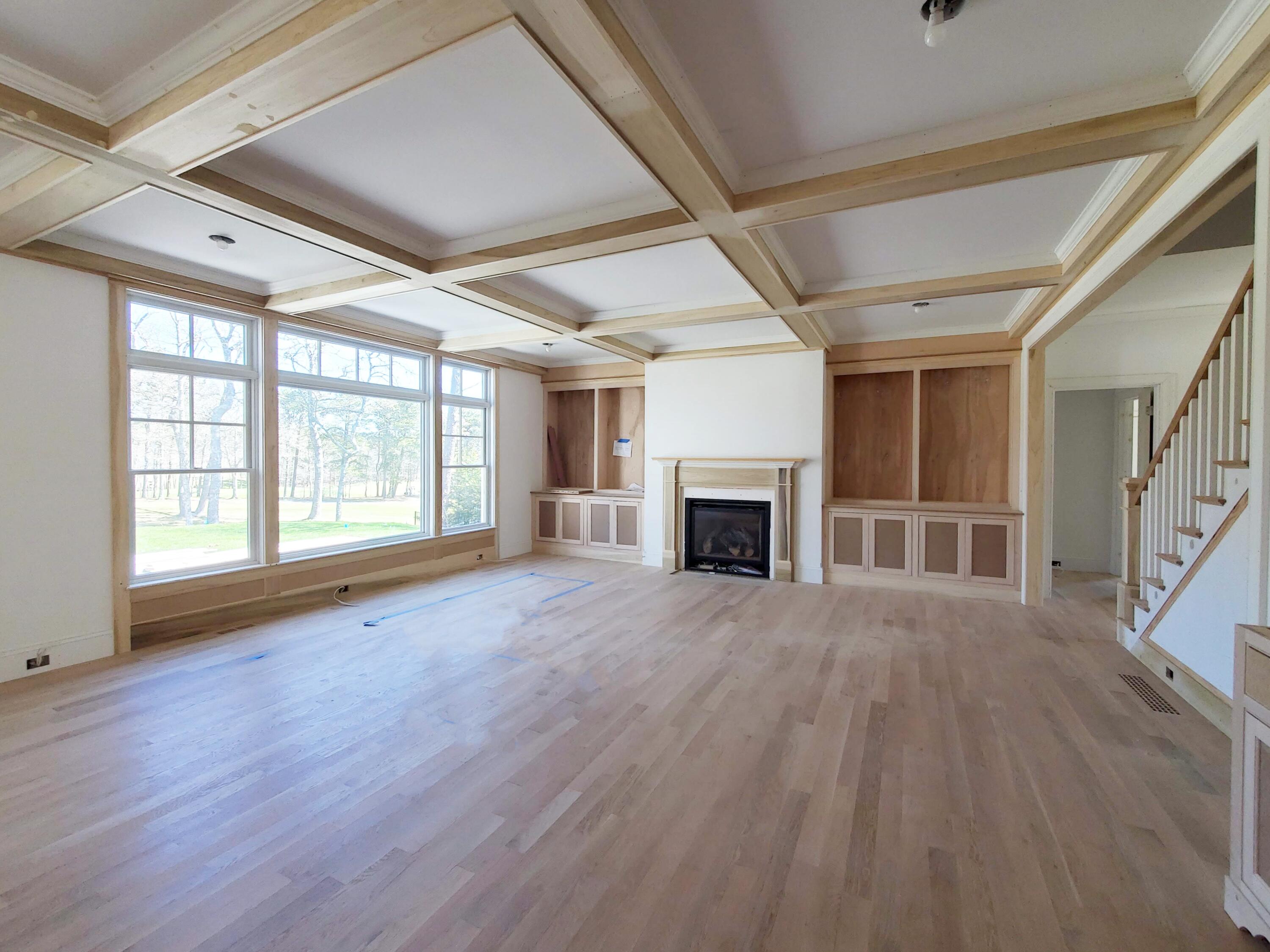 3 Snow Way Orleans, MA 02653 - Photo 15 of 33 a view of an empty room with wooden floor and a window